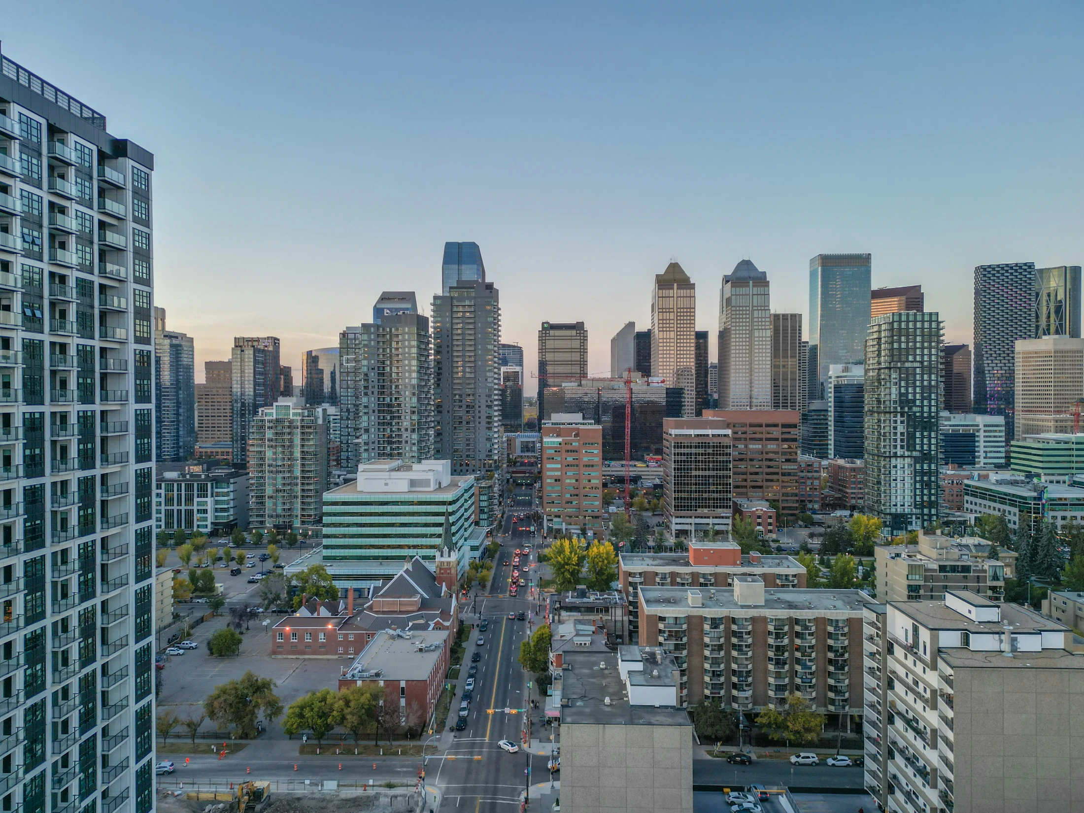 Aerial of downtown towers and condos at dusk