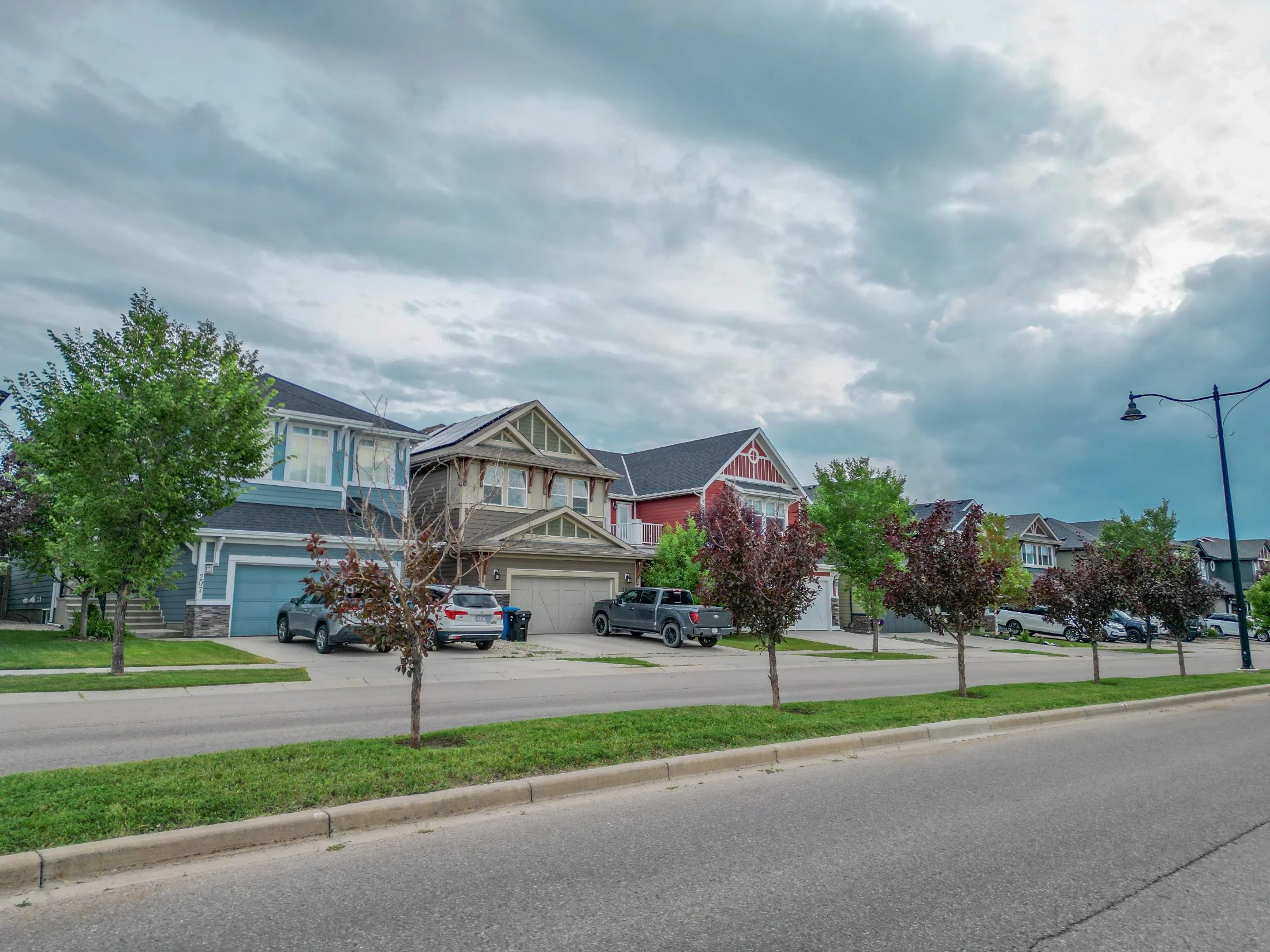 Two-storey family homes along a quiet street in northwest Calgary