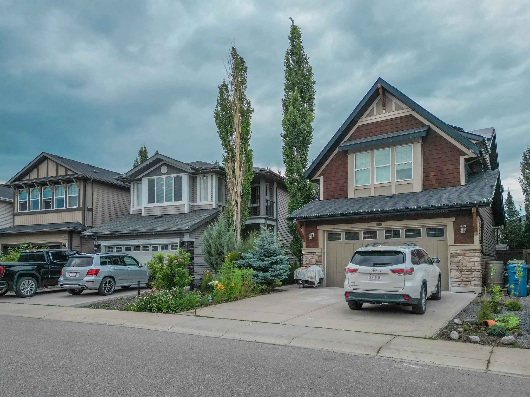 Two-storey and bi-level homes on a residential street in northwest Calgary