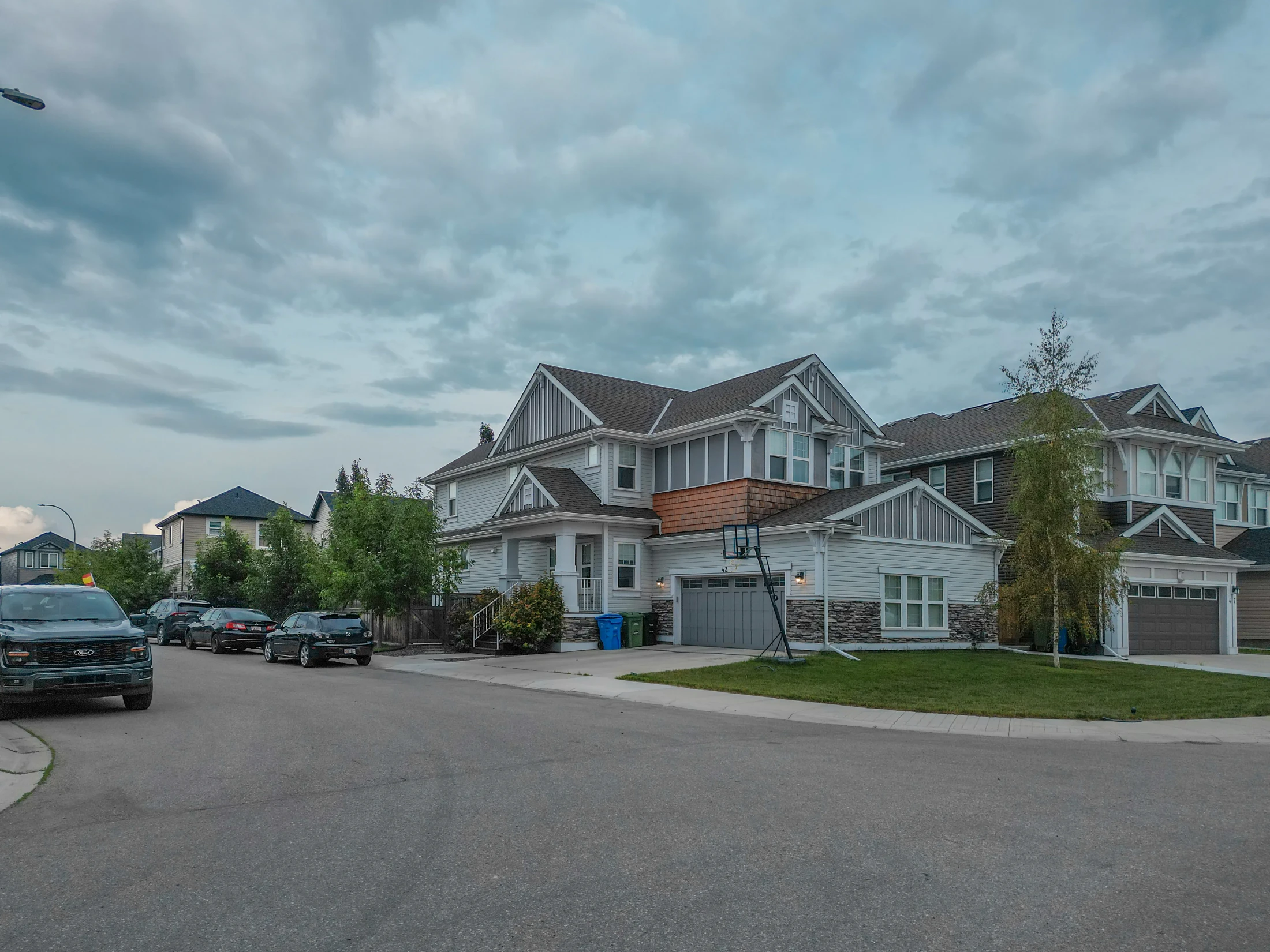 A detached home with a double garage on a northwest Calgary street