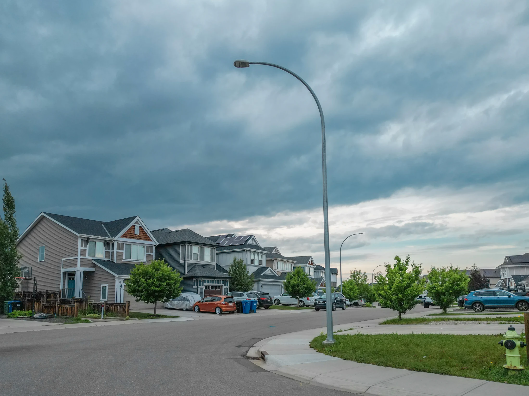 Detached homes with front garages on a quiet northwest Calgary street