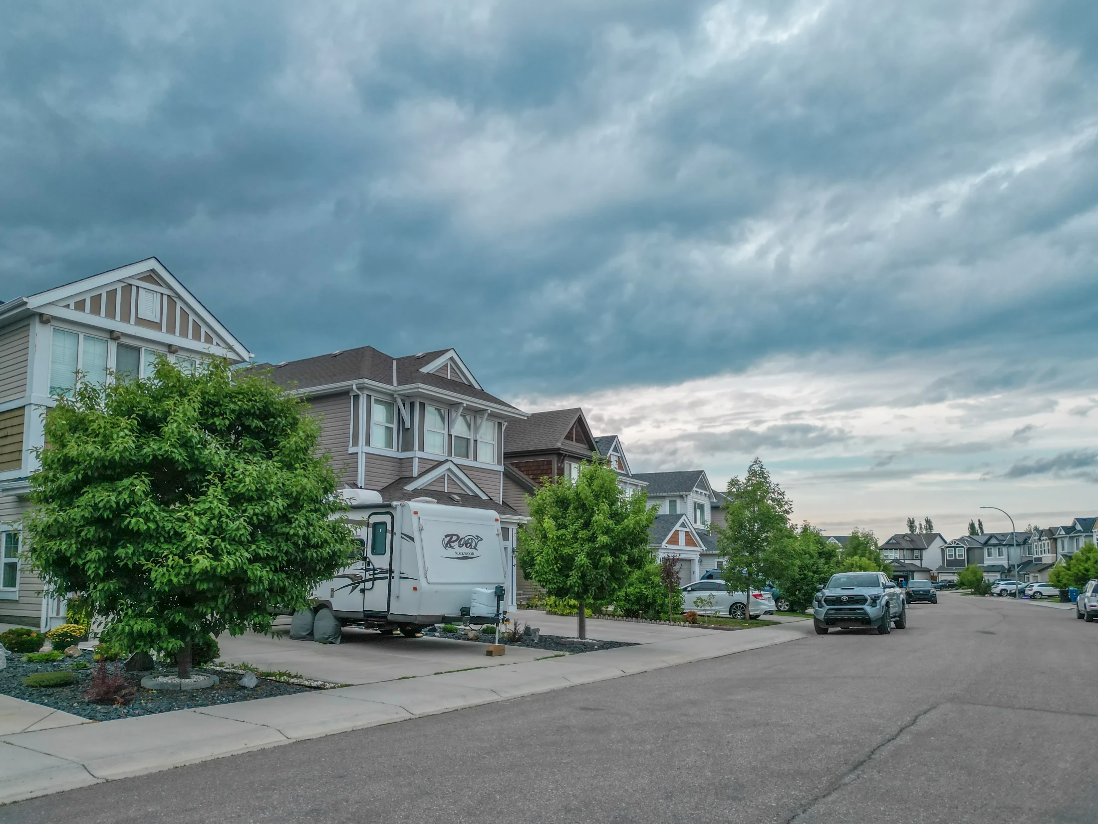 Large two-storey homes with double garages on a northwest Calgary street