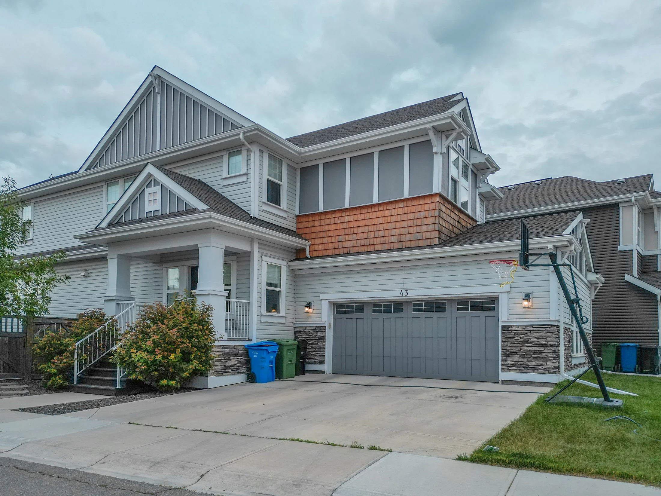 Two-storey homes with double garages on a quiet residential street in Calgary