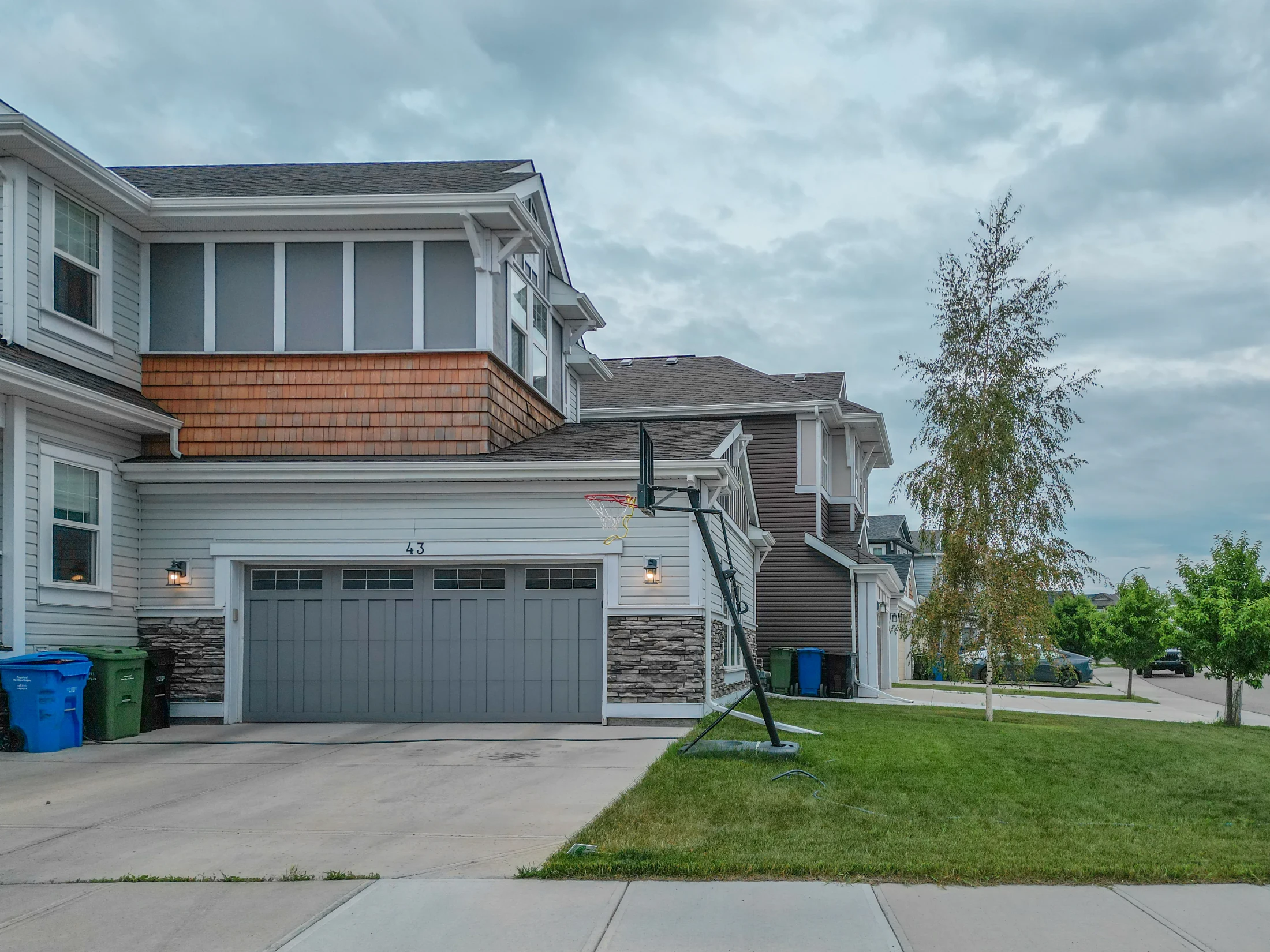Two-storey homes with front garages on a newer Calgary street