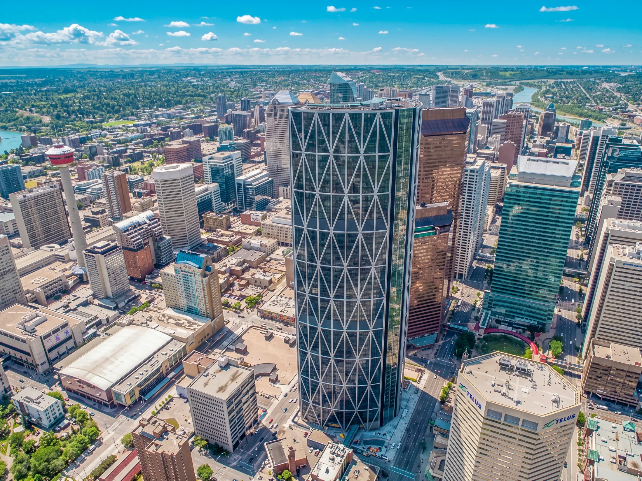 Aerial of The Bow tower and downtown Calgary office buildings