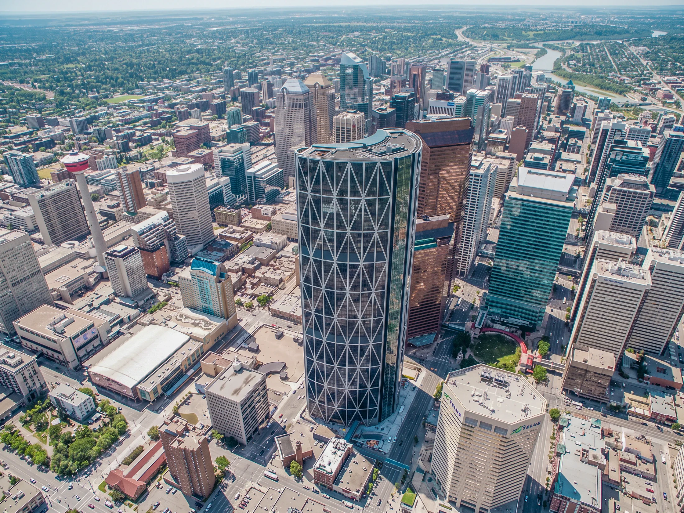 Aerial of The Bow tower and downtown Calgary buildings