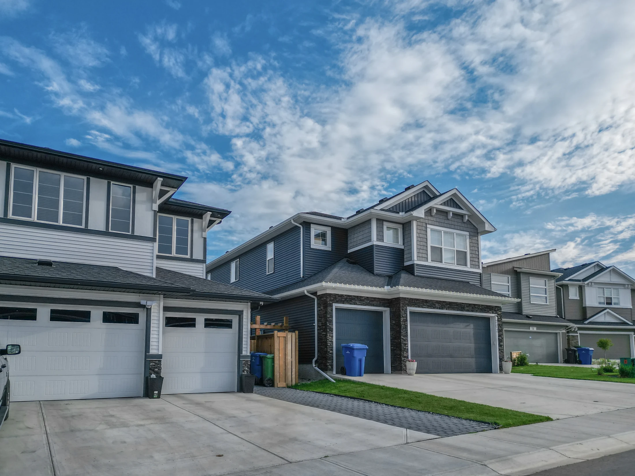 New two-storey homes with double front garages and small lawns