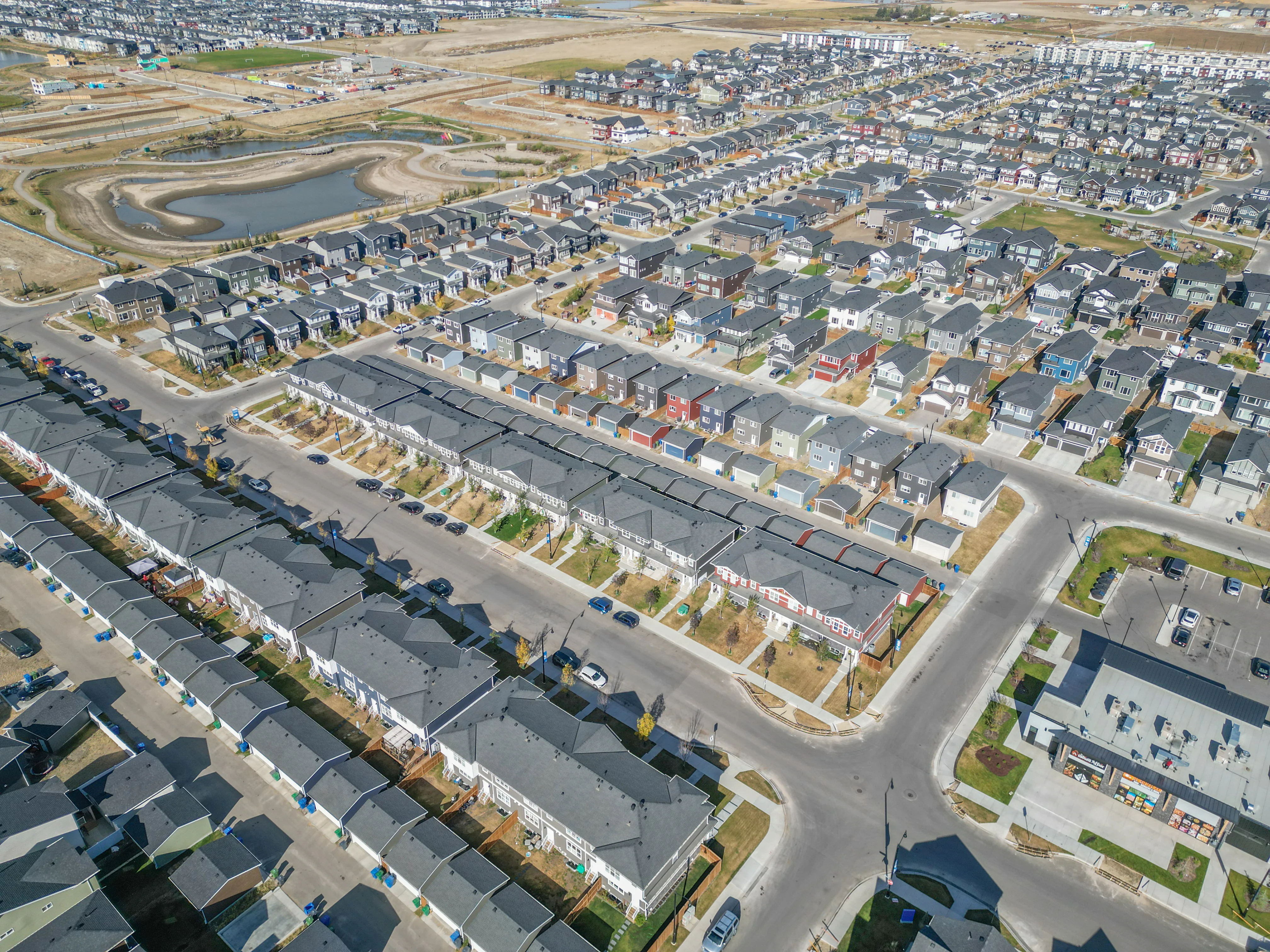 New homes on a Dawson's Landing street, Chestermere, Alberta