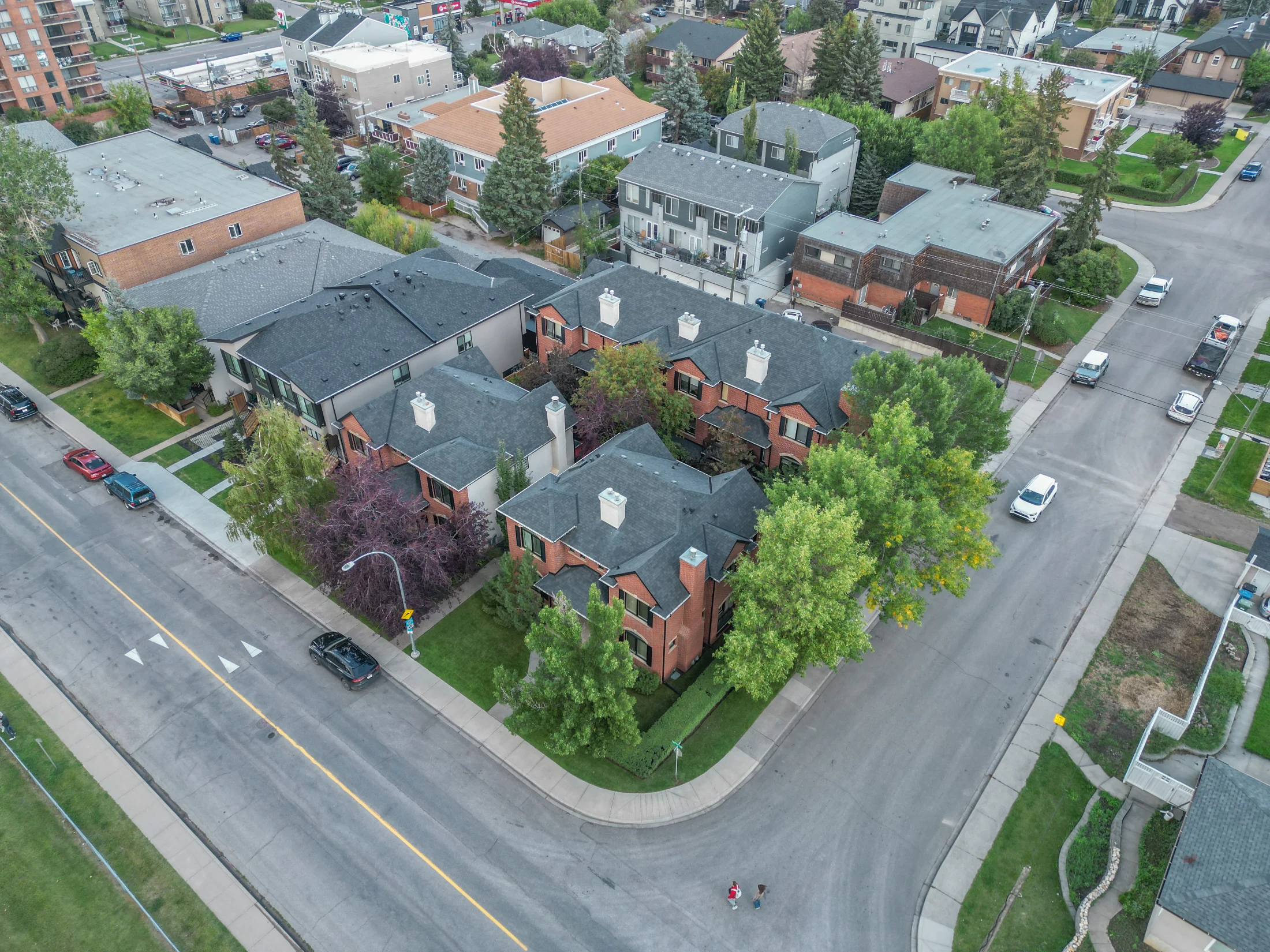 Aerial of tree-lined streets and homes in Killarney, Calgary