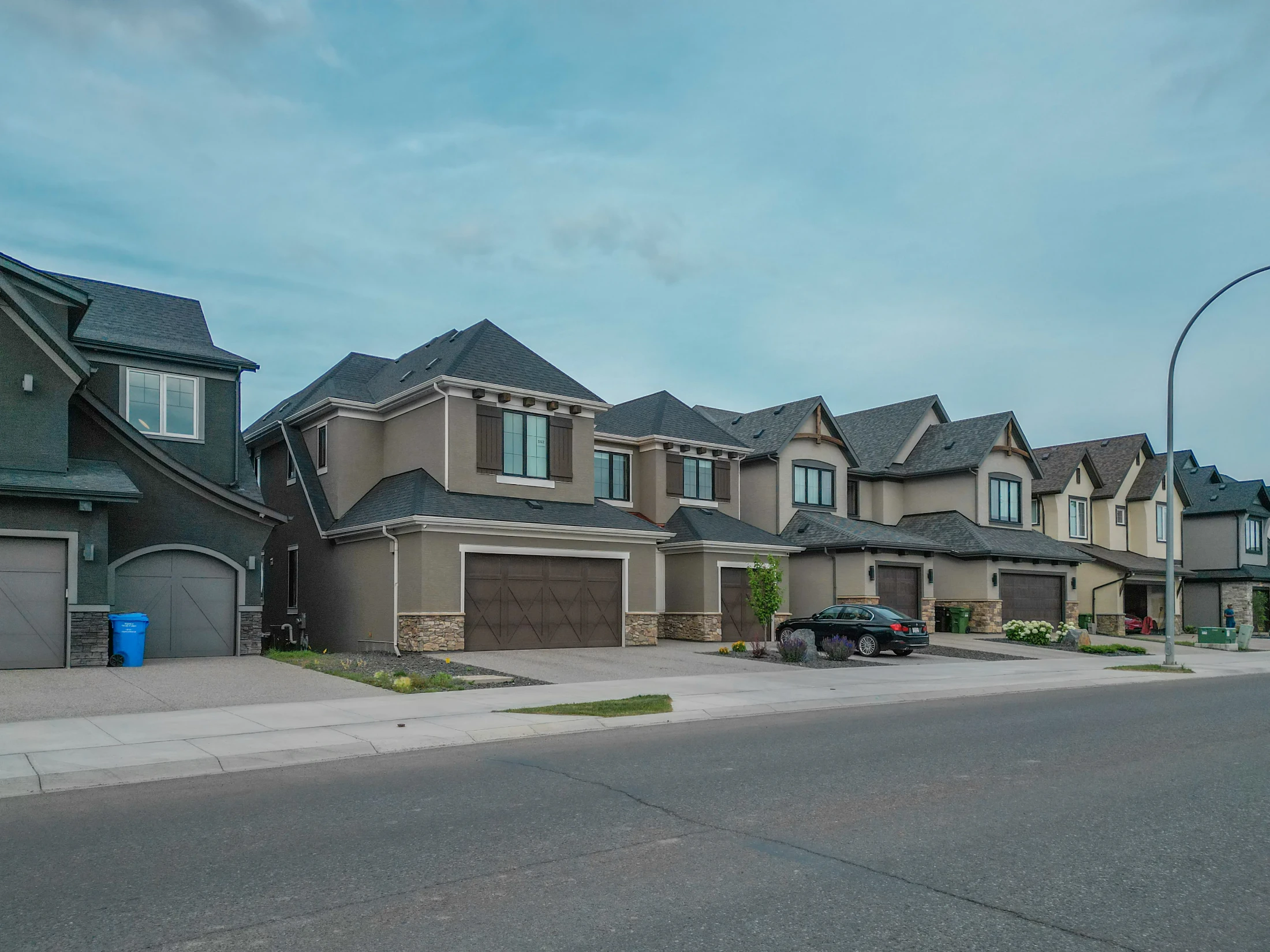 Front drive garage homes in Calgary