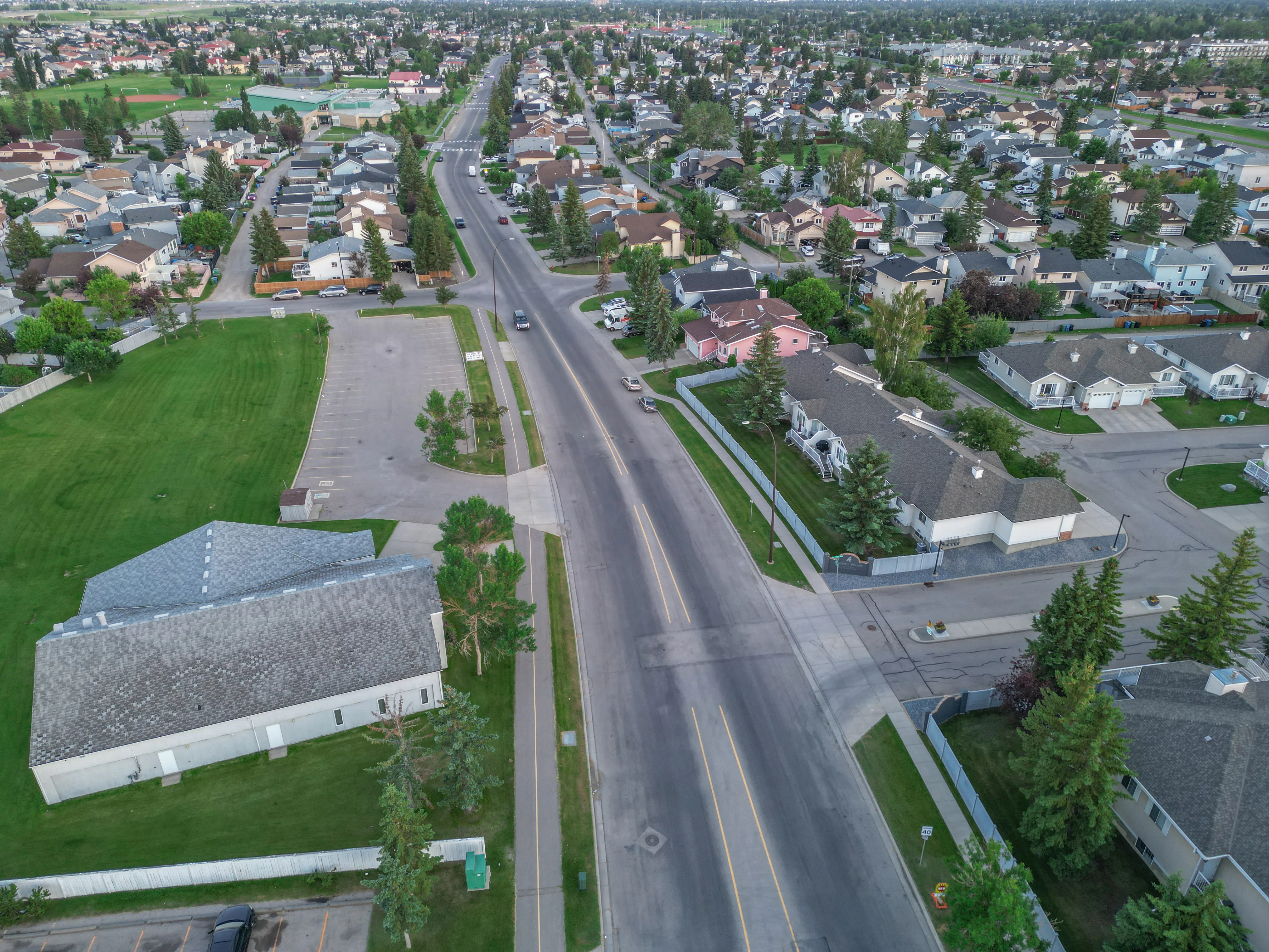 Aerial of a park beside a residential street