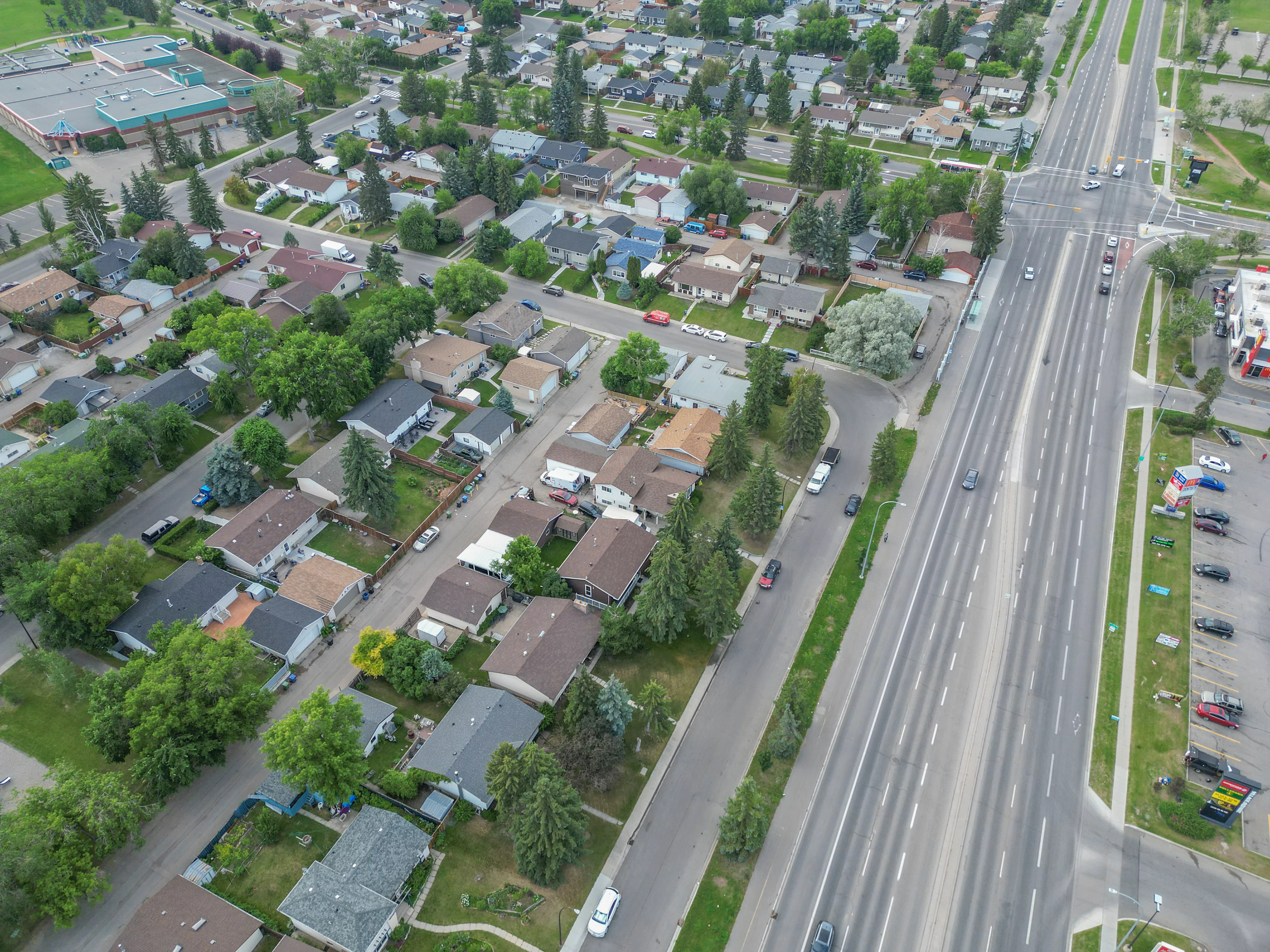 Aerial of homes beside a main road