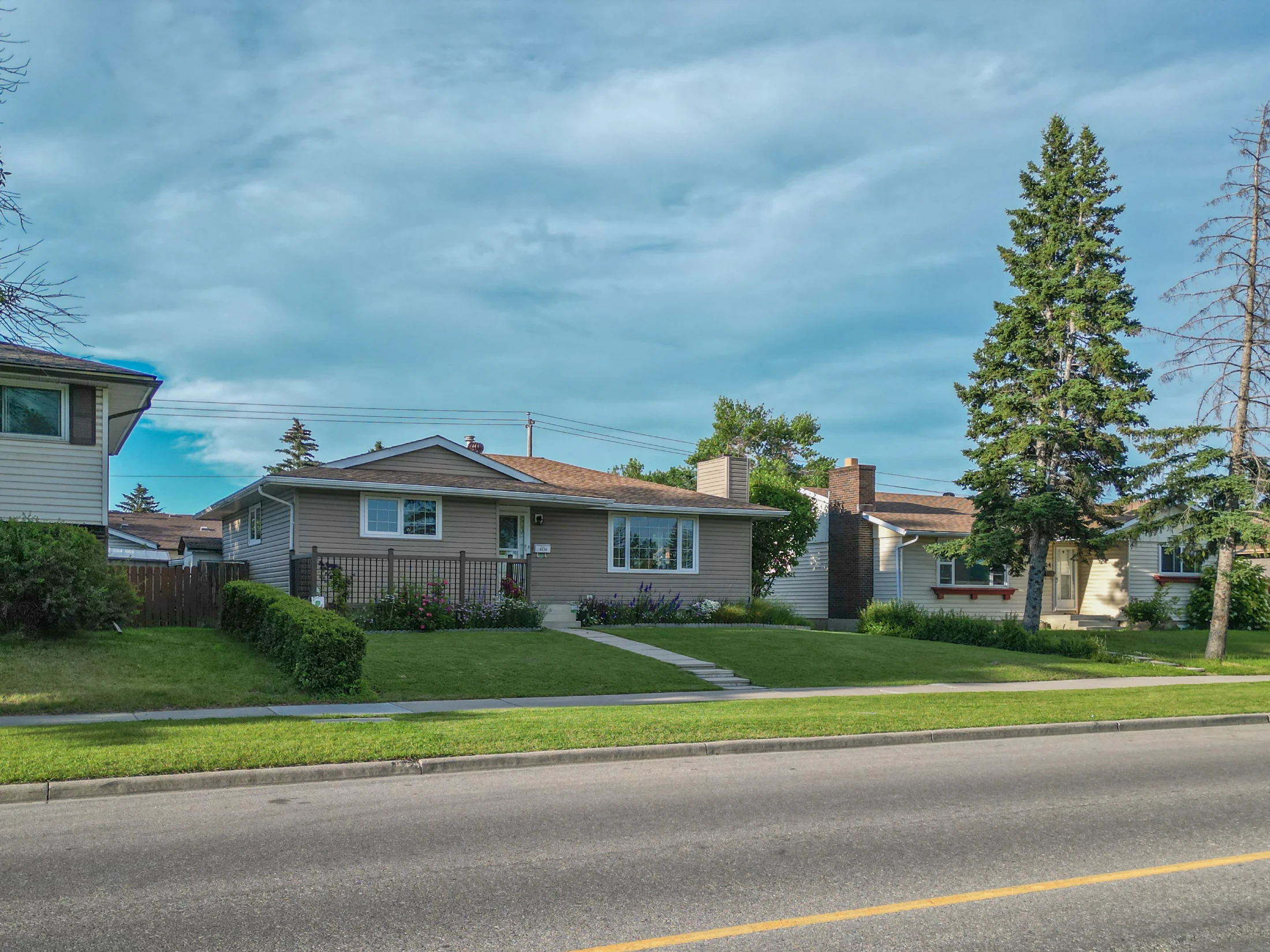 Bungalows with front lawns on a quiet residential street