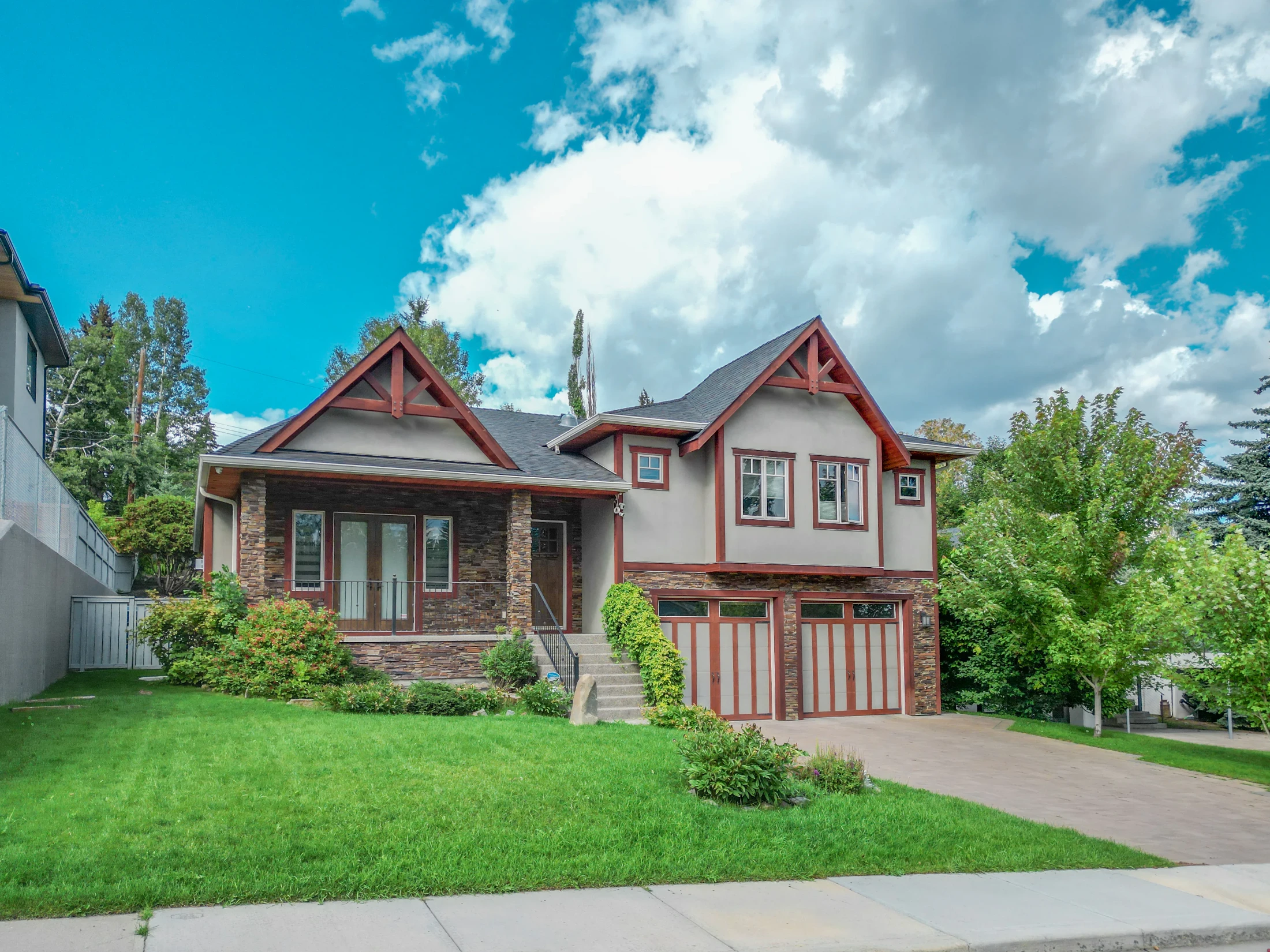 Character home with a peaked roof and a front garden