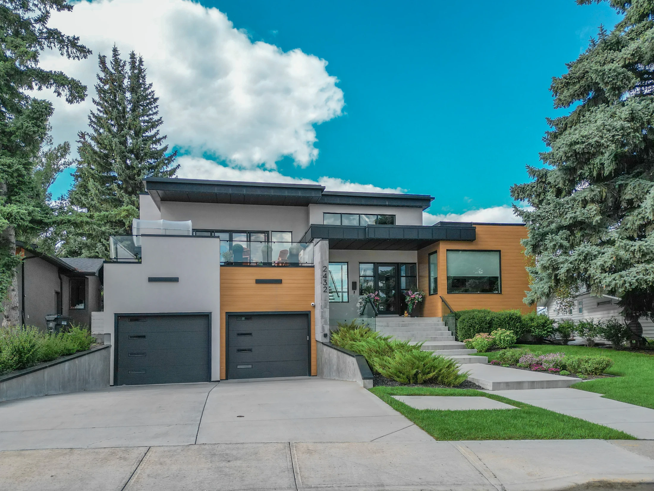 Modern detached home with front garage in SW Calgary