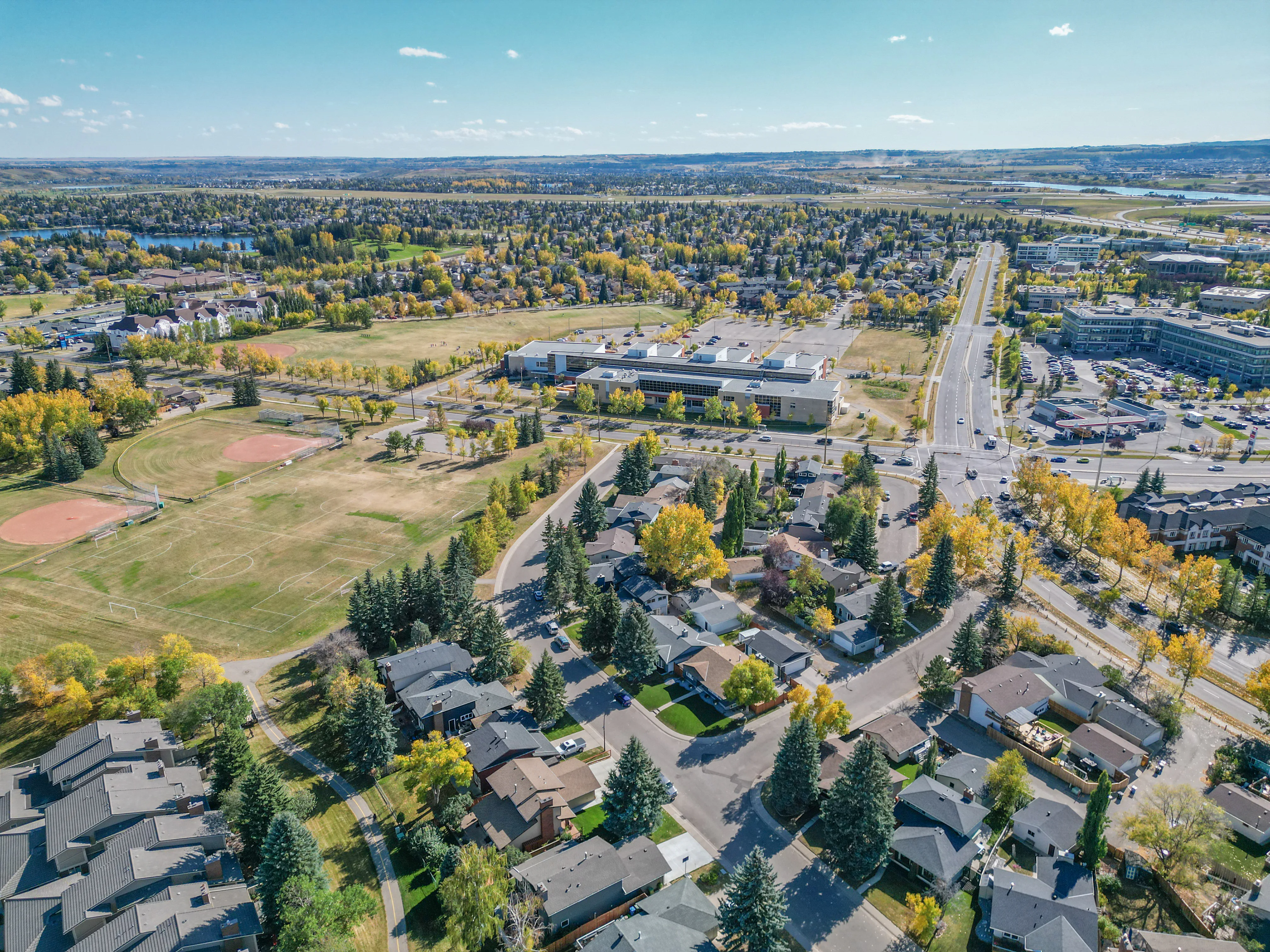 Aerial of a school, sports fields and surrounding homes