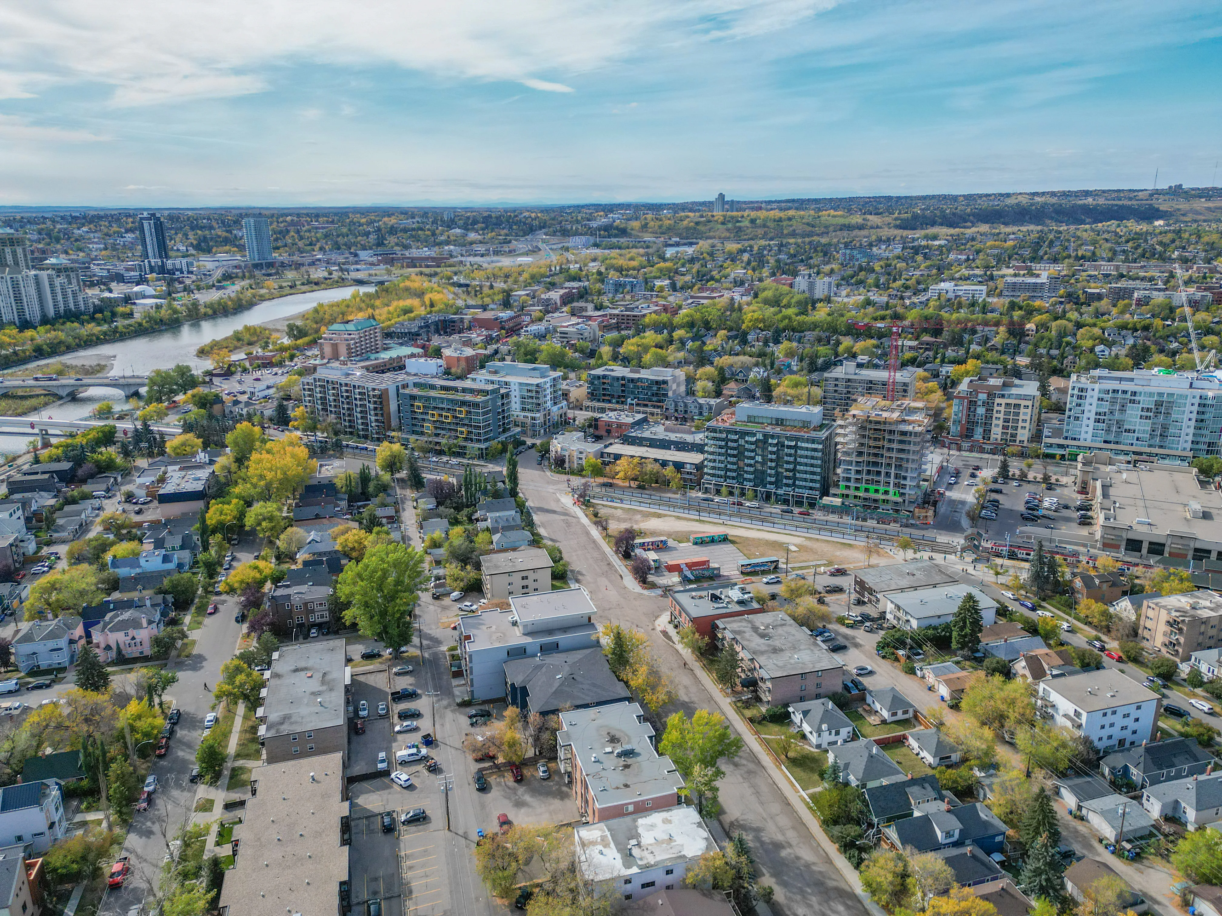 Aerial of inner-city condos and homes near the river and downtown