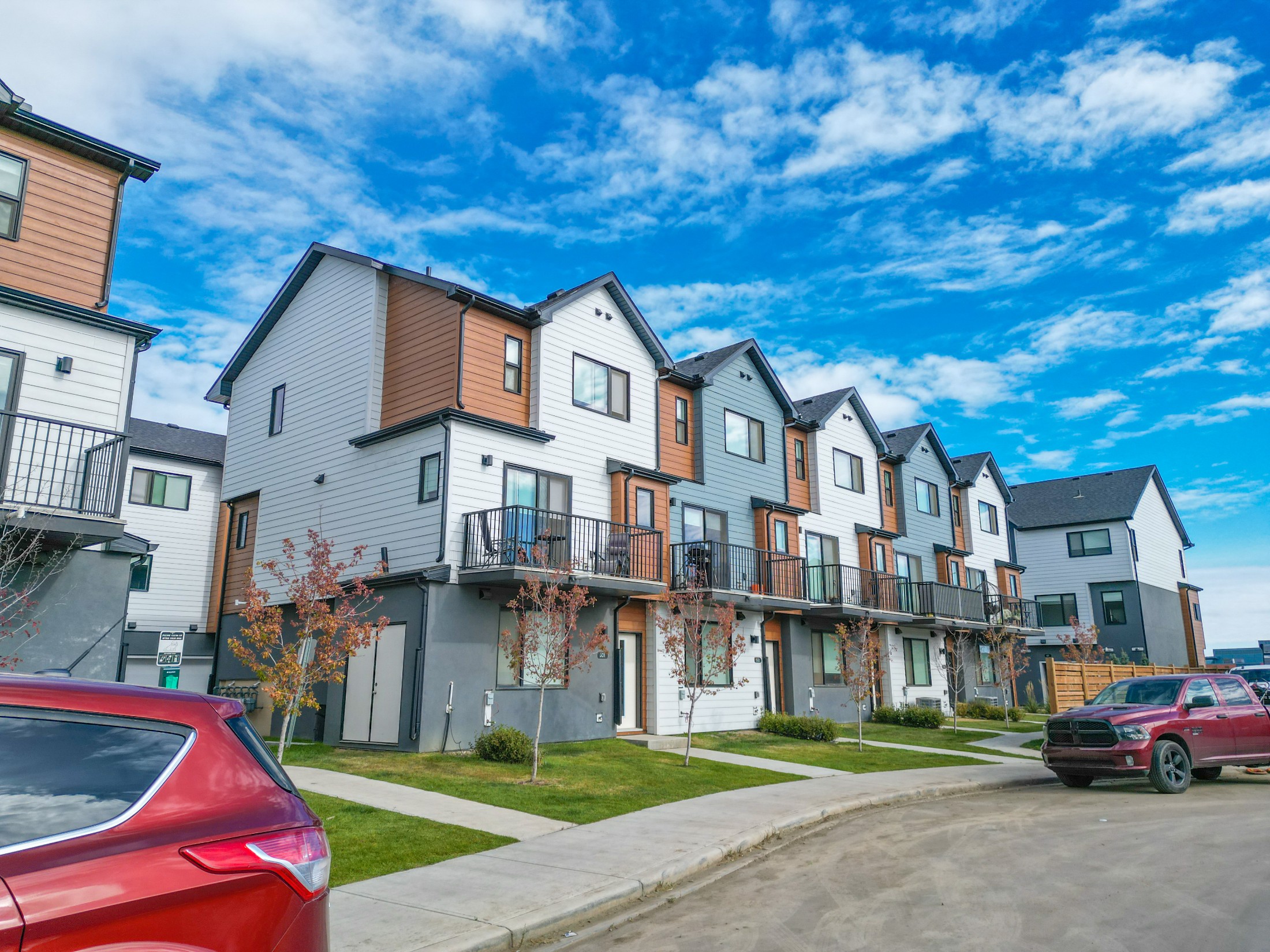 Row homes and Sora townhouses for sale in Hotchkiss SE Calgary